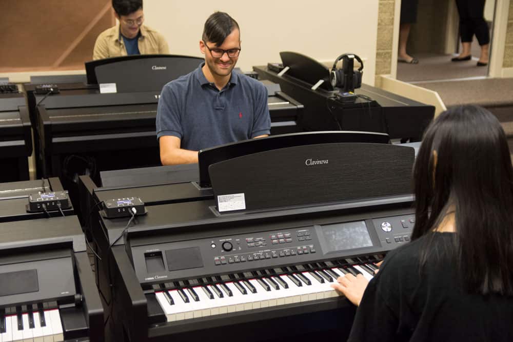 Students using new pianos