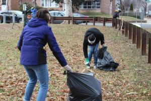 students cleaning trailhead