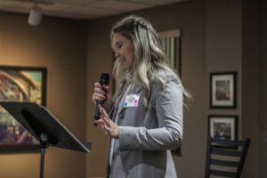 student speaks at event
