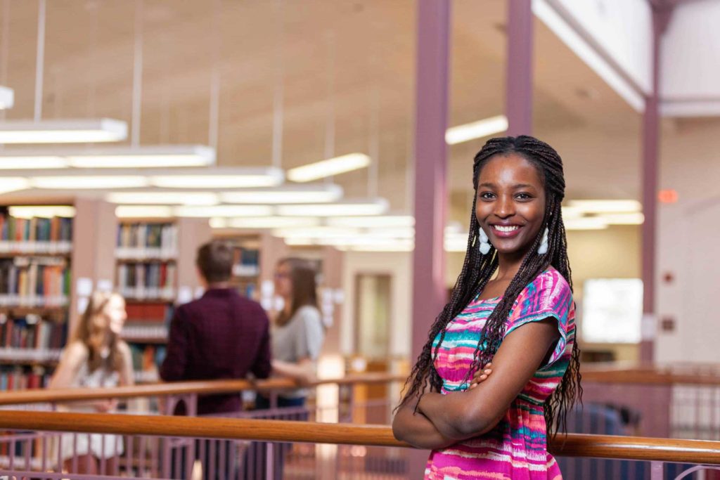 cairn university student in library