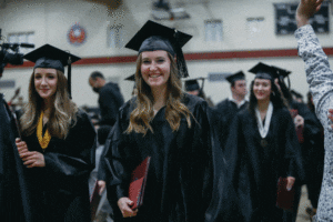 graduate smiling at camera