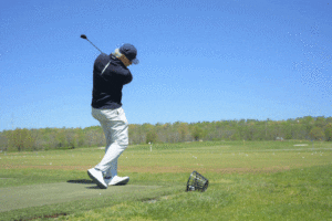 golfer swinging a club