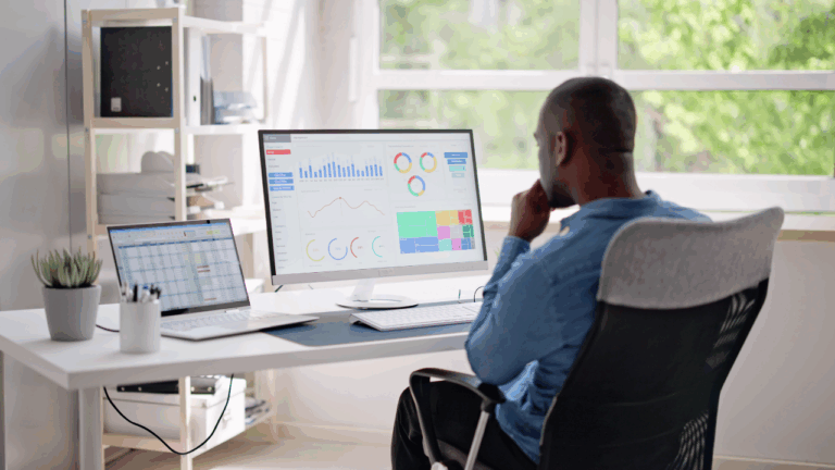 A picture of a data graduate working on data analytics.