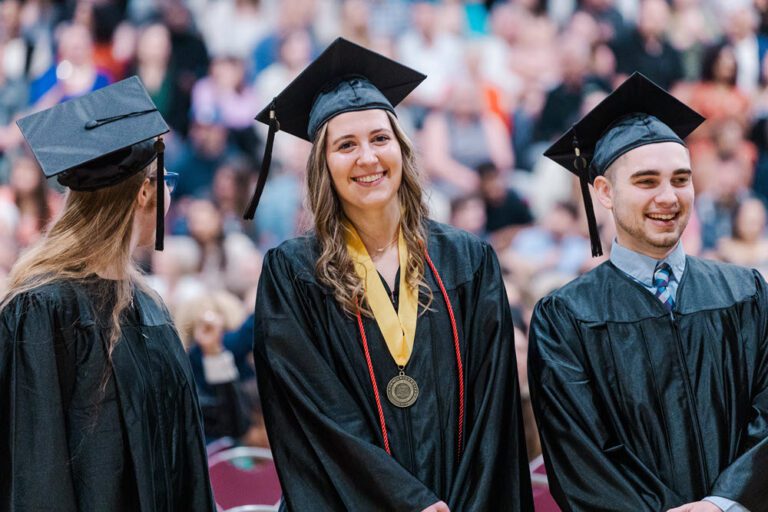 A picture of a Cairn counseling student at commencement.
