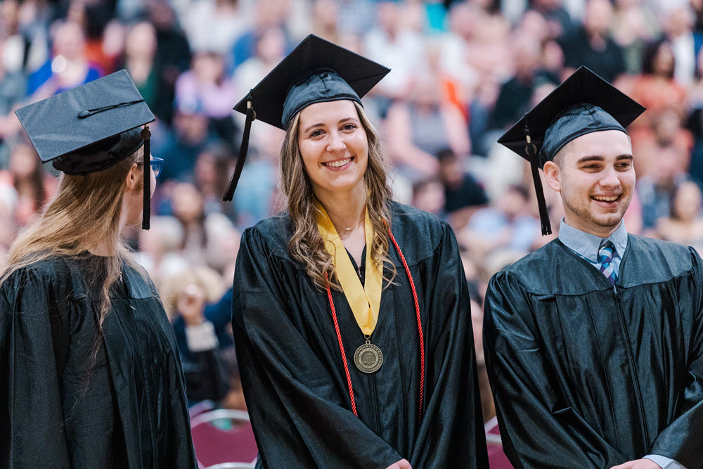 A picture of a Cairn counseling student at commencement.