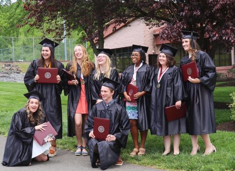 Cairn University graduates in cap and gown